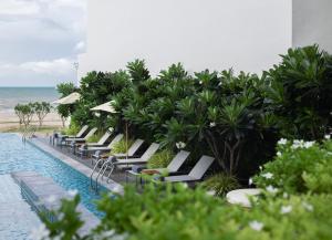 Bazén v ubytování Eastin Resort Rayong nebo v jeho okolí