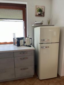 Kuchyňa alebo kuchynka v ubytovaní Apartment GINA