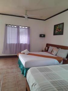 Postel nebo postele na pokoji v ubytování Bonita Oasis Beach Resort + 37 fotografií