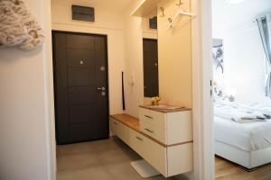 Ένα ή περισσότερα κρεβάτια σε δωμάτιο στο Apartman White orchid