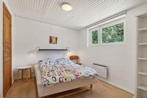 Ένα ή περισσότερα κρεβάτια σε δωμάτιο στο Lovely Summer House With Sauna And Terrace