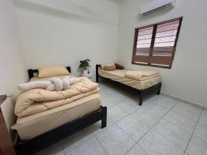 Postel nebo postele na pokoji v ubytování Kajang Cheras Semenyih putrajaya small party house + 62 fotografií