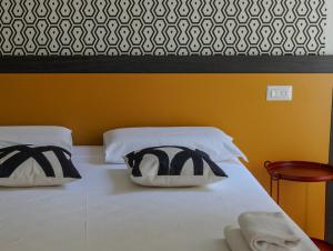 Postel nebo postele na pokoji v ubytování FEEL - Mille Suites