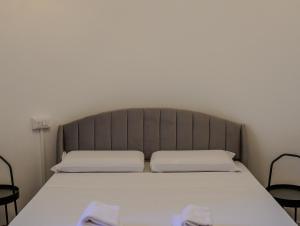 Postel nebo postele na pokoji v ubytování FEEL - Mille Suites
