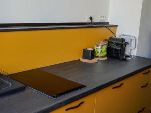 Kuchyň nebo kuchyňský kout v ubytování FEEL - Mille Suites + 37 fotografií