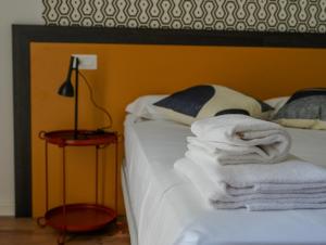 Postel nebo postele na pokoji v ubytování FEEL - Mille Suites