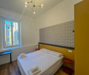 Postel nebo postele na pokoji v ubytování FEEL - Mille Suites
