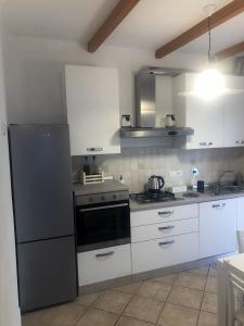 Kuchyň nebo kuchyňský kout v ubytování Garden House Cristina La Spezia 5 terre