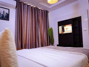 Voodi või voodid majutusasutuse 247 Luxury Hotel toas