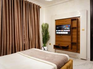 Voodi või voodid majutusasutuse 247 Luxury Hotel toas
