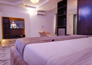 Voodi või voodid majutusasutuse 247 Luxury Hotel toas