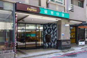 an entrance to a store with a sign on it at CHECK inn Express Taichung Fengchia in Taichung