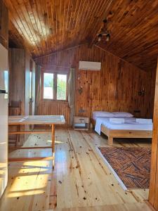 Katil atau katil-katil dalam bilik di Çıralı Nun Bungalove