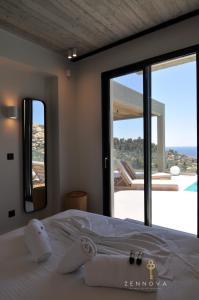 Ένα ή περισσότερα κρεβάτια σε δωμάτιο στο Leisure Gates 1 +41 φωτογραφίες