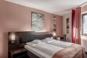 Letto o letti in una camera di Josl Mountain Lounging Hotel - Adults only!