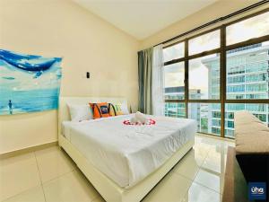 Ένα ή περισσότερα κρεβάτια σε δωμάτιο στο Palazio Serviced Apartments by RR JBcity +112 φωτογραφίες