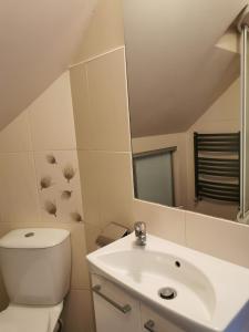 Koupelna v ubytování Miers un klusums pie jūras + 8 fotografií