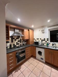 Η κουζίνα ή μικρή κουζίνα στο Luxury Flat close to City Centre & Docks