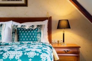 Postel nebo postele na pokoji v ubytování Arcadia Boutique Hotel