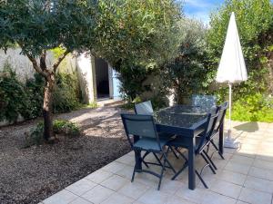 Κήπος έξω από το Maison lumineuse, de plain-pied, avec jardin clos - A 5mn de la plage +12 φωτογραφίες