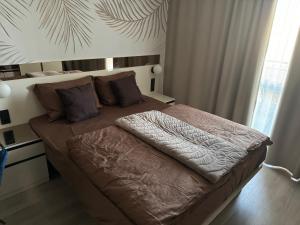 Giường trong phòng chung tại Sorrento Sole Mare Studio Appartment +13 ảnh