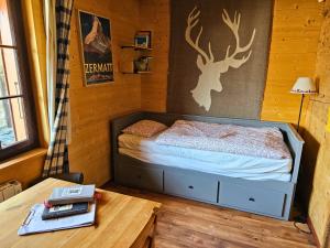 Postel nebo postele na pokoji v ubytování Tiny house La Grange Inden