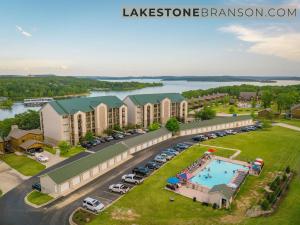an aerial view of a resort with a pool and parking lot at Condo #353 in Branson