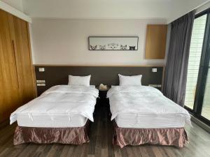 Sunny Sky Homestay客房内的一张或多张床位