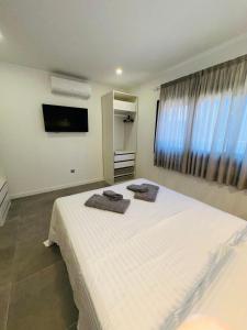 Katil atau katil-katil dalam bilik di Zulia Suites, Masca, Teide Los Gigantes, excursions, AC, Wifi7