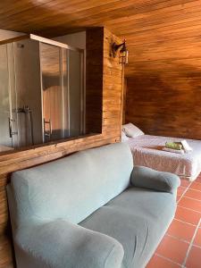 A bed or beds in a room at Casa Hobbit