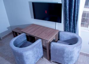 TV a/nebo společenská místnost v ubytování Streamlive Hotel and Spa