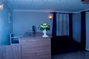 TV a/nebo společenská místnost v ubytování Streamlive Hotel and Spa