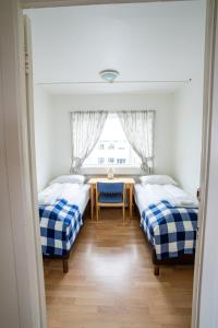 Postel nebo postele na pokoji v ubytování The Nest