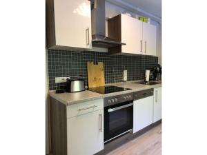 Køkken eller tekøkken på Ferienhaus am Waldschwimmbad