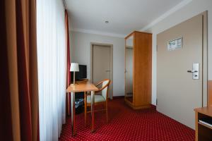 TV a/nebo společenská místnost v ubytování Hotel Mirage