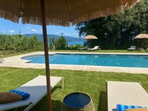 Bazén v ubytování Vigna Caio Relais & Spa nebo v jeho okolí
