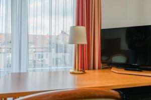 TV a/nebo společenská místnost v ubytování Hotel Mirage