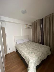Postel nebo postele na pokoji v ubytování Apesinho Brás - Downtown Smart Living