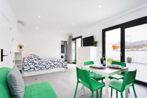 Μια τηλεόραση ή/και κέντρο ψυχαγωγίας στο Zulia Suites, Masca, Teide, Los Gigantes, Excursions, AC, Wifi-6