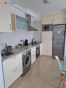 Kuchyňa alebo kuchynka v ubytovaní MarMédano Apartamento 1