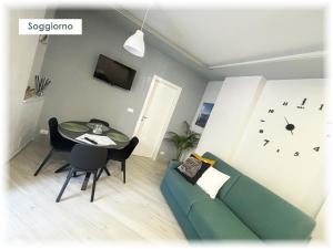 Телевизор и/или развлекательный центр в La Brezza Home Sanremo