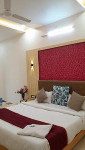 Voodi või voodid majutusasutuse Hotel Sun Palace toas