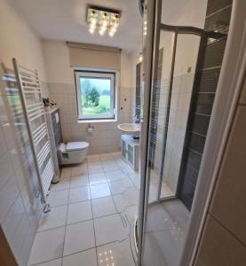 Koupelna v ubytování Ferienwohnung Heiterwanger-Blick