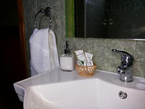 Bilik mandi di VALYAK rent apart hotel - Servicios Integrales