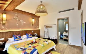 Postel nebo postele na pokoji v ubytování Wuzhen Residence B&B