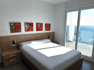 A bed or beds in a room at Agi Joan Margarit
