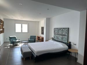 A bed or beds in a room at Agi Joan Margarit