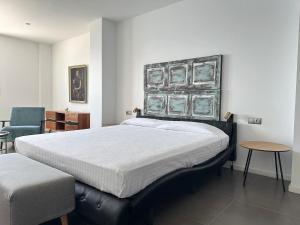 A bed or beds in a room at Agi Joan Margarit