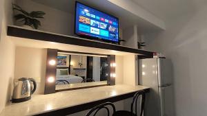 Kuchyň nebo kuchyňský kout v ubytování Paradise Inn + 11 fotografií