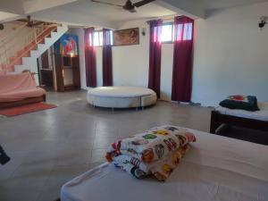 Ένα ή περισσότερα κρεβάτια σε δωμάτιο στο Bemaso